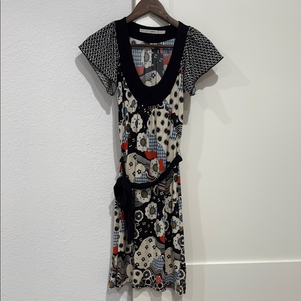 Chic Black and White Midi Dress with Flutter Sleeves
